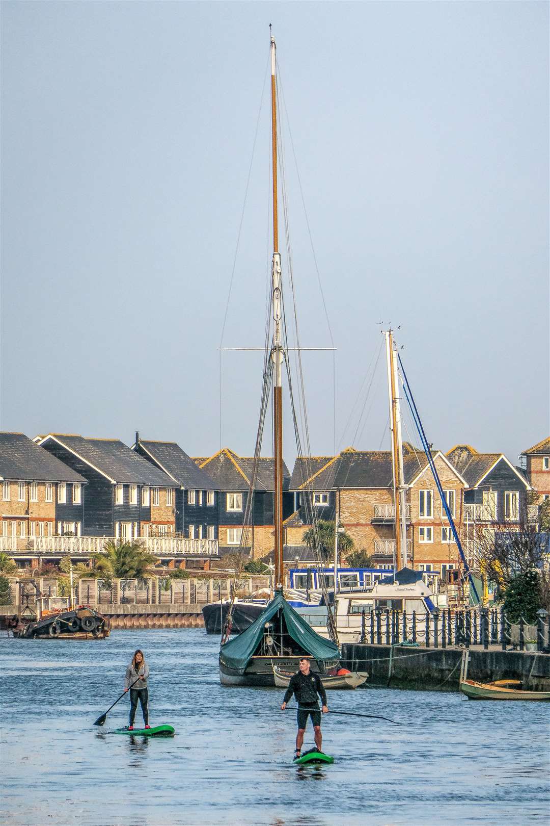 A very high tide on Faversham Creek, showing how it's enjoyed. Pic: Trevor Fentiman