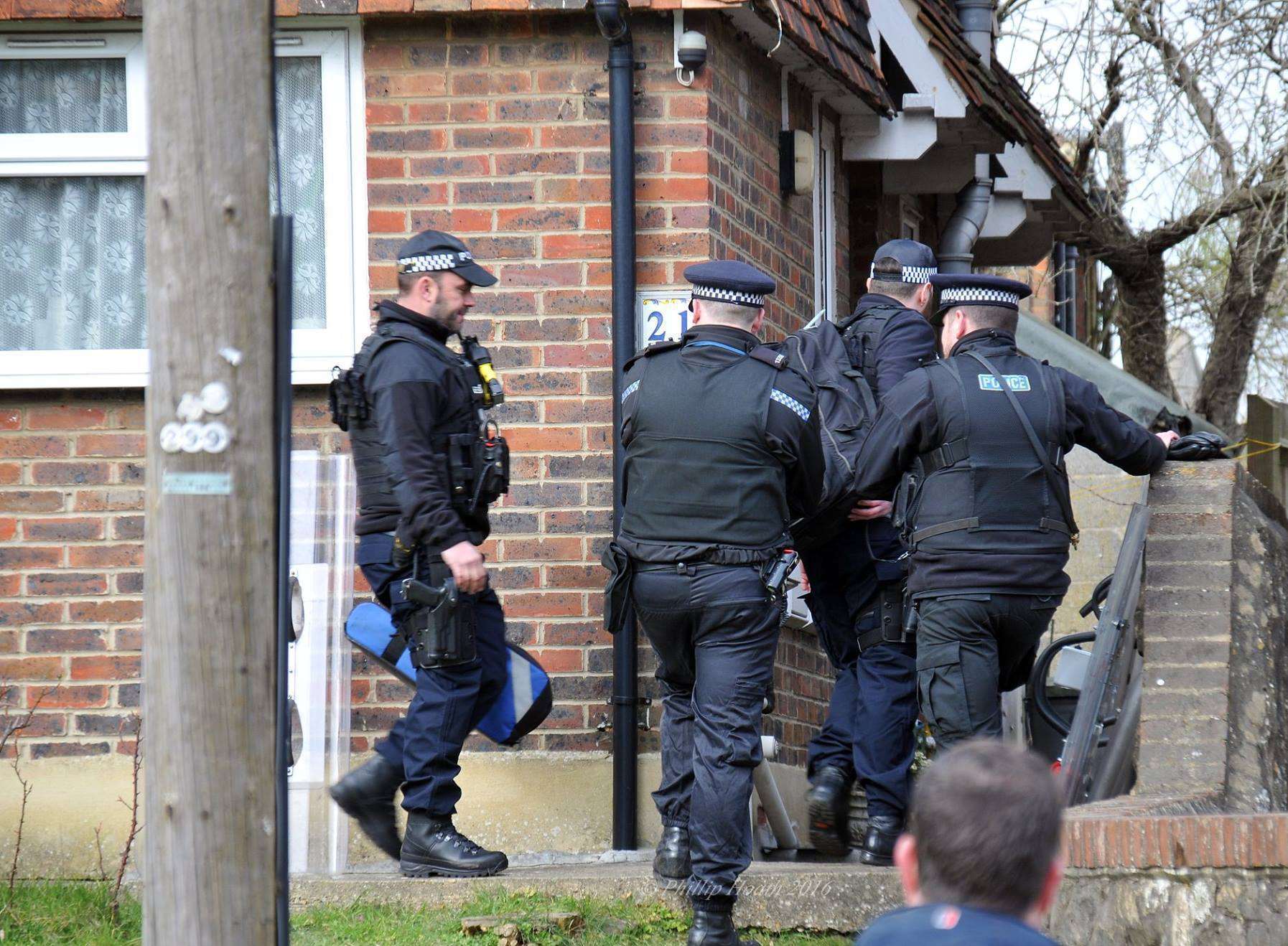 Armed police during an operation. Stock image