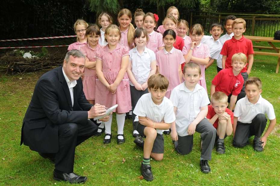 Editor Matt Ramsden with pupils near the mysterious nest