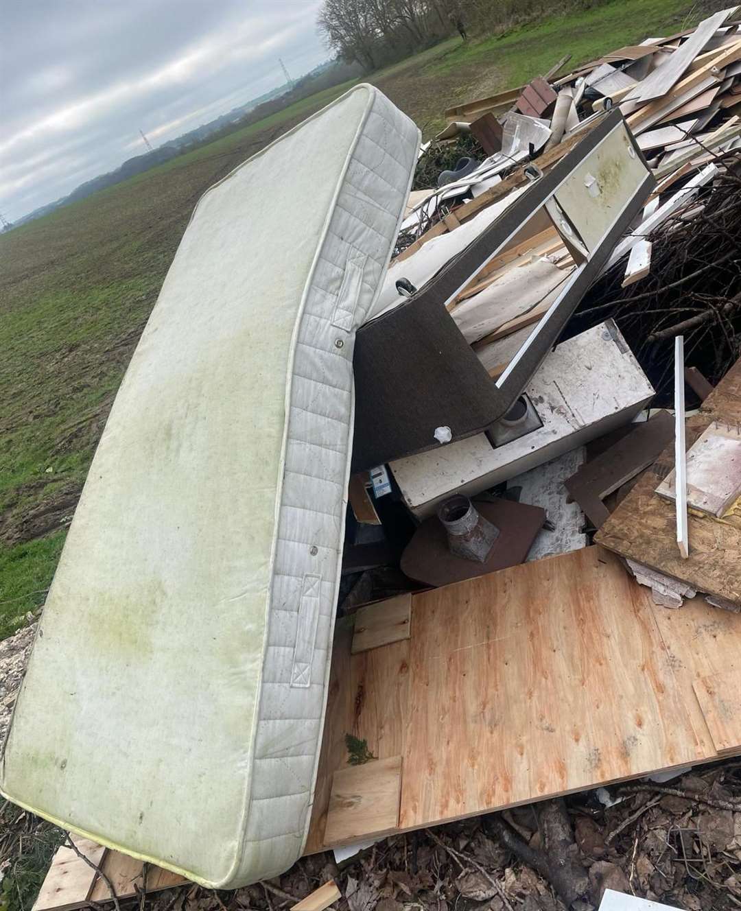 A bed and mattress were dumped near Evegate Business Park. Picture: ABC