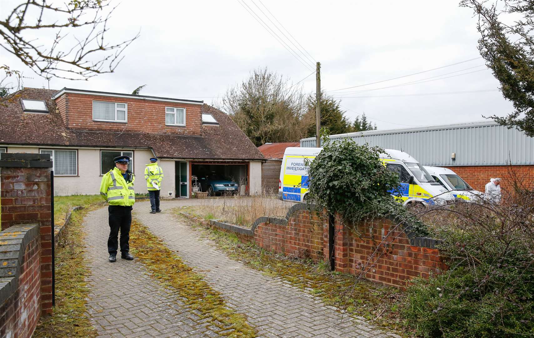 Police at the scene of Roy Blackman's murder in Biddenden. Picture: Matthew Walker