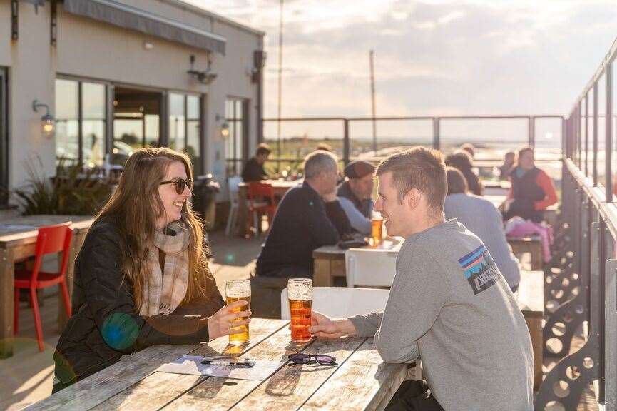 The head of a Kent pub chain believes later this month is the right time to remove social distancing rules. Pictured is the Minnis Bay in Birchington