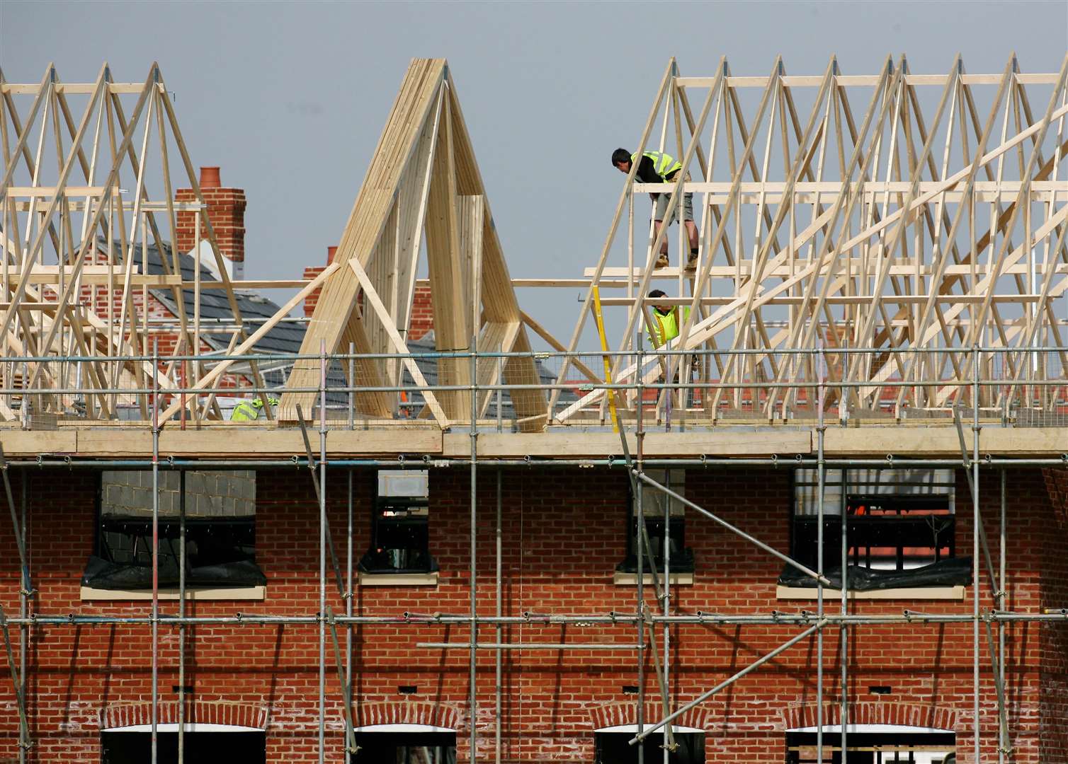 The roofer was working on scaffolding before his fall. Stock image