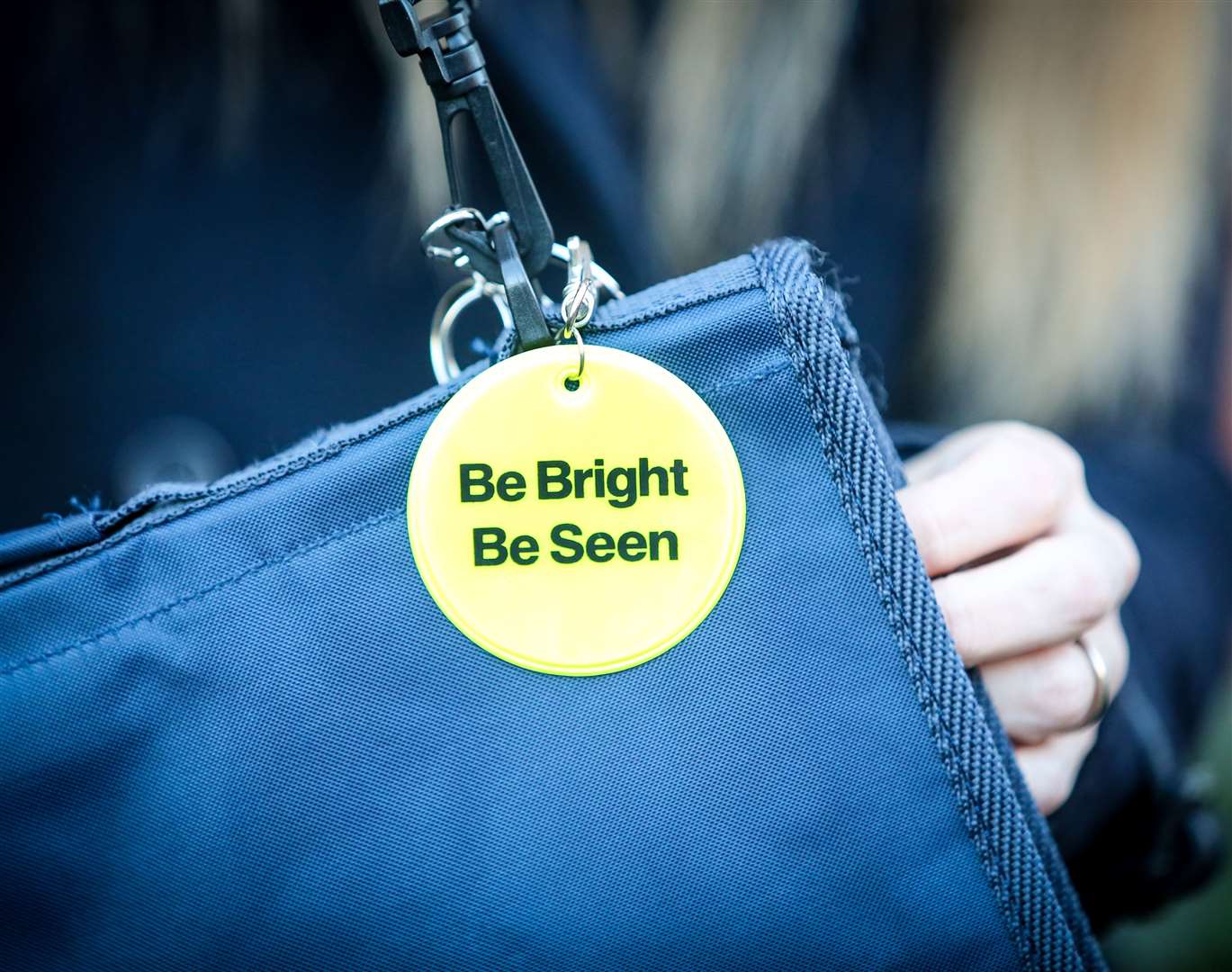 The keyrings are designed to be clipped on clothes and school book bags. Picture: Matthew Walker.