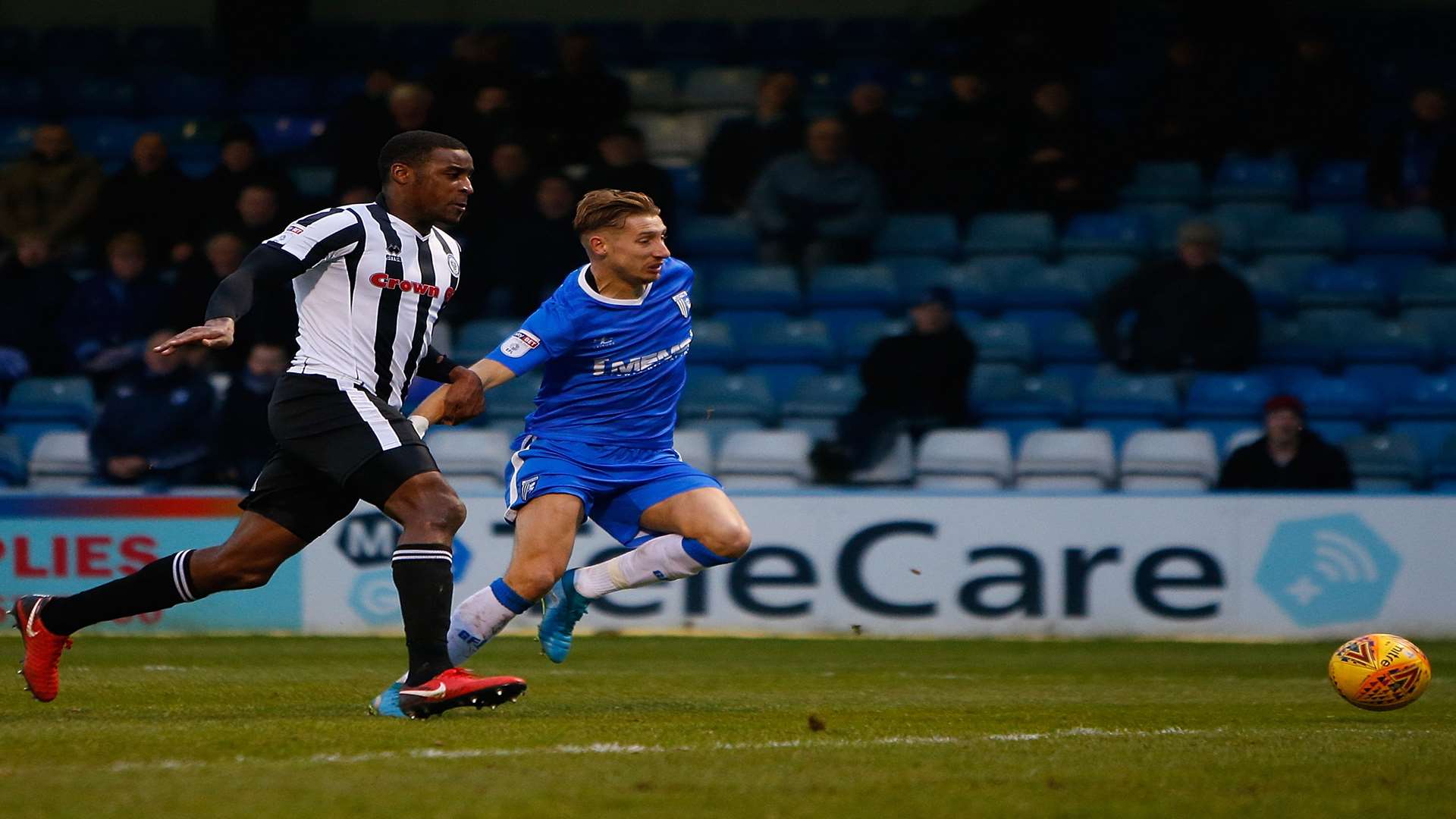 Gills skipper Lee Martin gives chase against Rochdale last month. Picture: Andy Jones