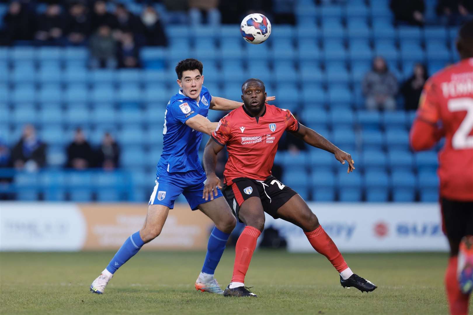 Elkan Baggott challenges John Akinde for the ball (61549302)