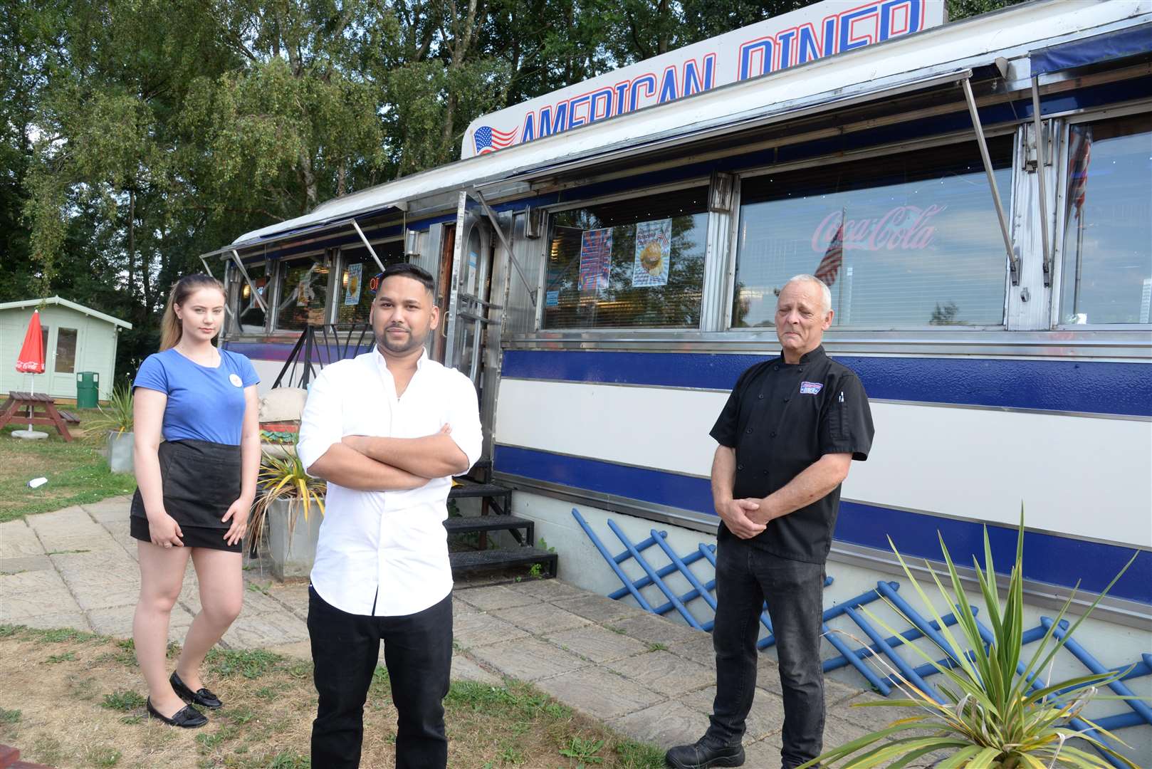 MDM "Royal" Karim with staff Chantelle Wood and Chris Headech at the American Diner in Cemetery Lane, Ashford. Picture: Chris Davey