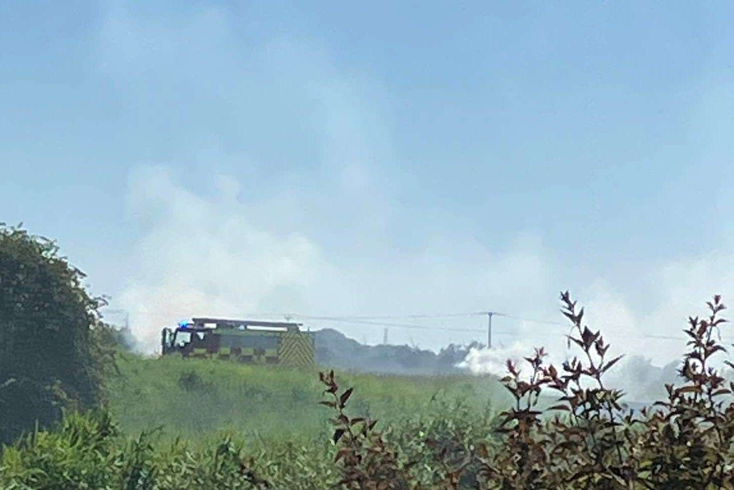 Firefighters tackled a fire on a railway embankment in St Mary's Bay, Dymchurch. Picture: Janet Holland