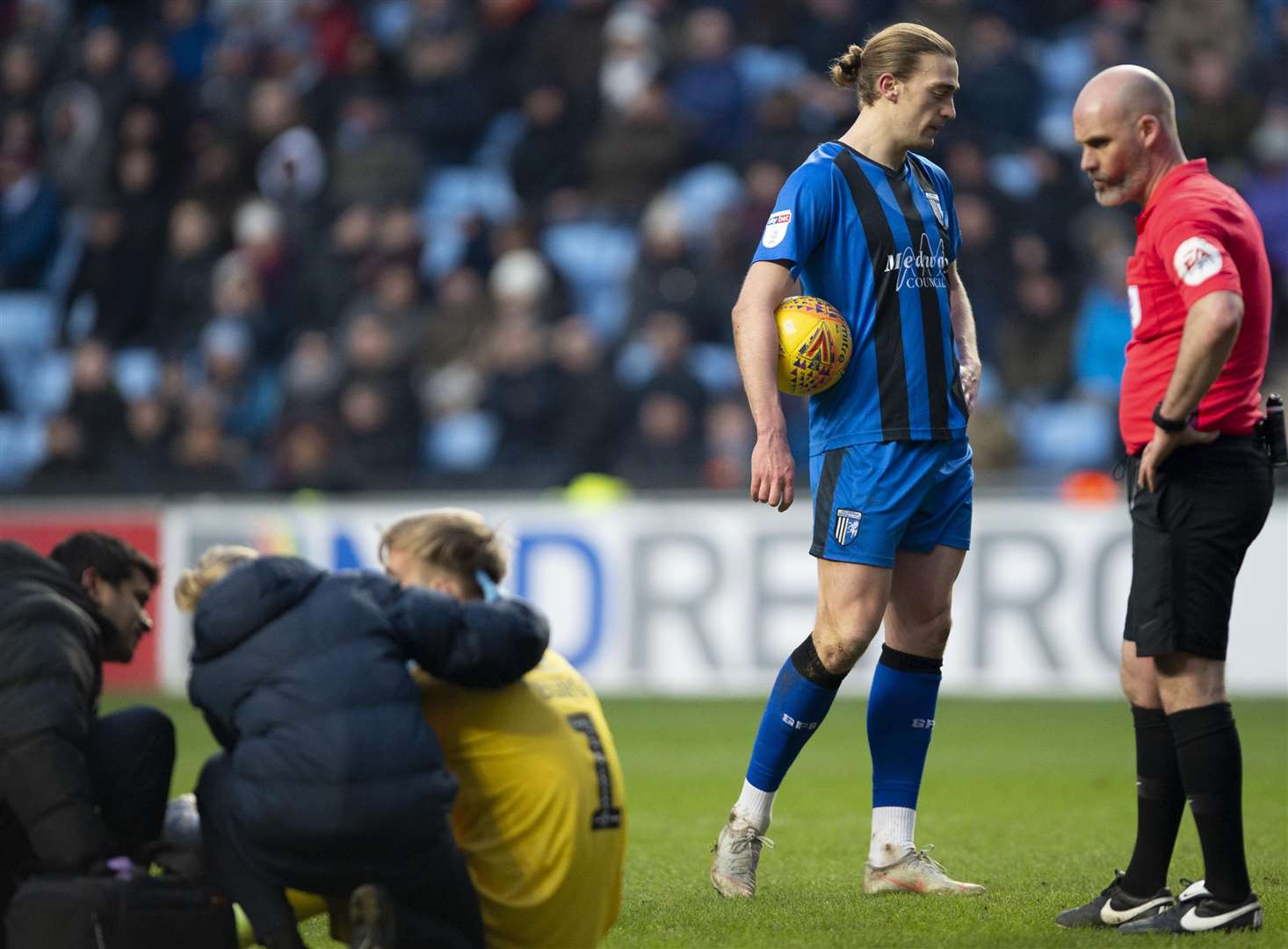 Tom Eaves has to wait to take his penalty as Coventry keeper Lee Burge gets attention for a head injury Picture: Ady Kerry