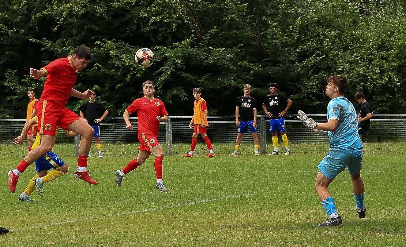 Harvey Smith heads towards goal for Whitstable at Redhill. Picture: Les Biggs