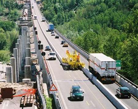 The barrier is "unzipped" to ease the flow of traffic