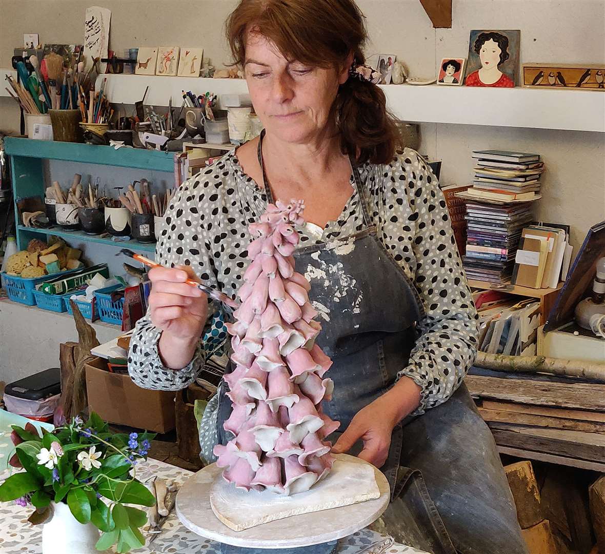 Jane Richardson glazing foxgloves at Swinford Studio at Godinton House & Gardens