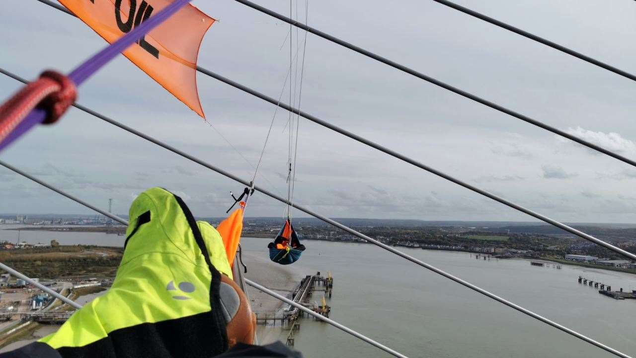 Just Stop Oil protesters remain at the top of the QEII Picture: Just Stop Oil