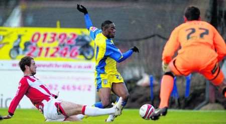 Dennis Oli asks questions of the Exeter defence