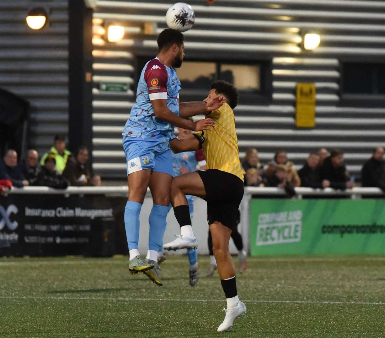 Hosts Maidstone and Weymouth battle for the ball in the air. Picture: Steve Terrell