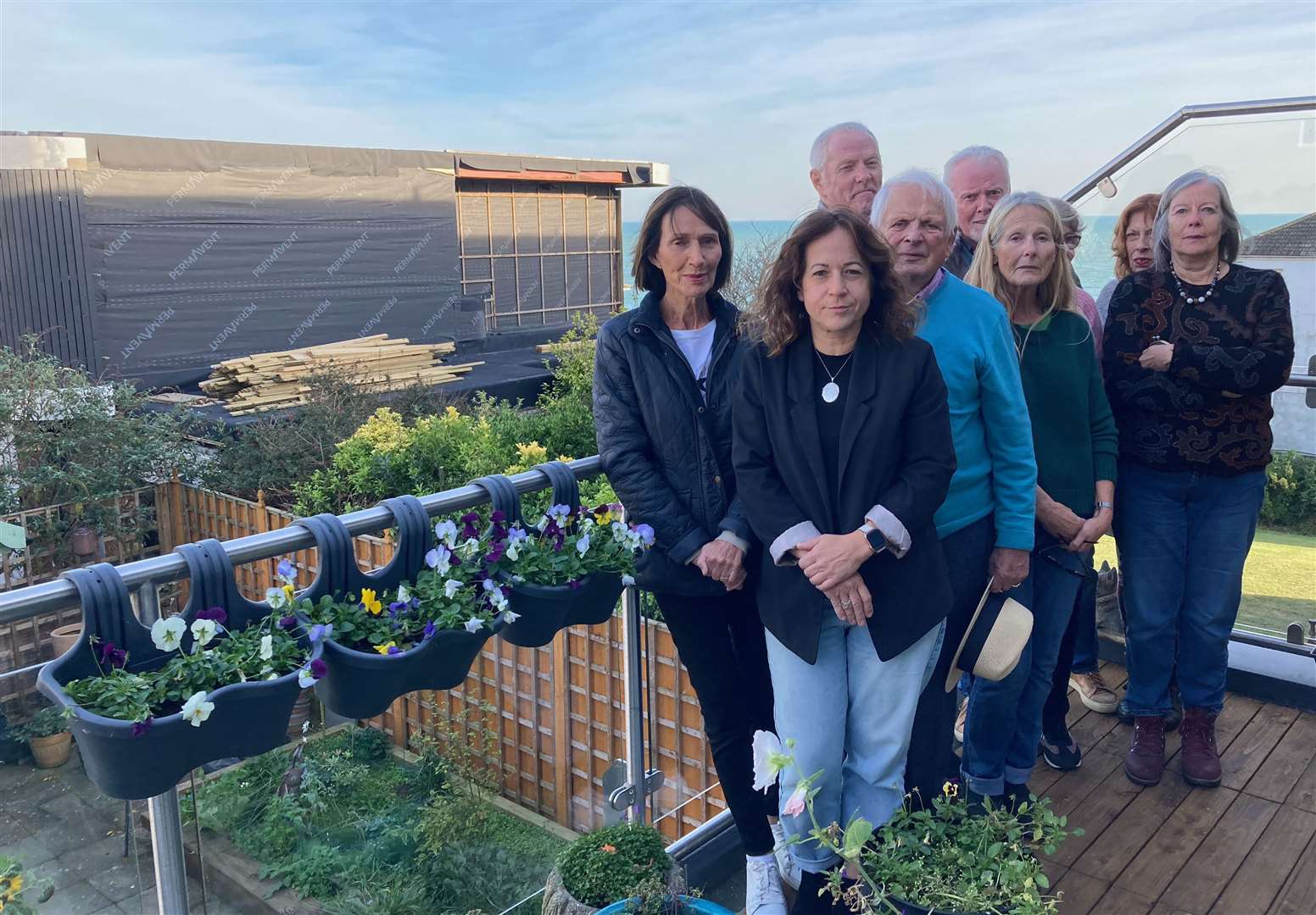 Residents on a neighbour's balcony which overlooks Heatherbank in Sunnyside Road, Sandgate. Picture: