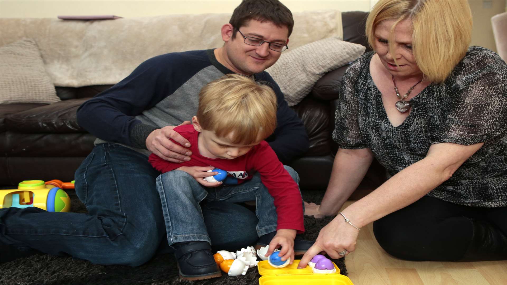 Kris and Becky with their son William. Picture: Martin Apps