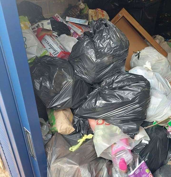 The bin store is overflowing due to missed collections