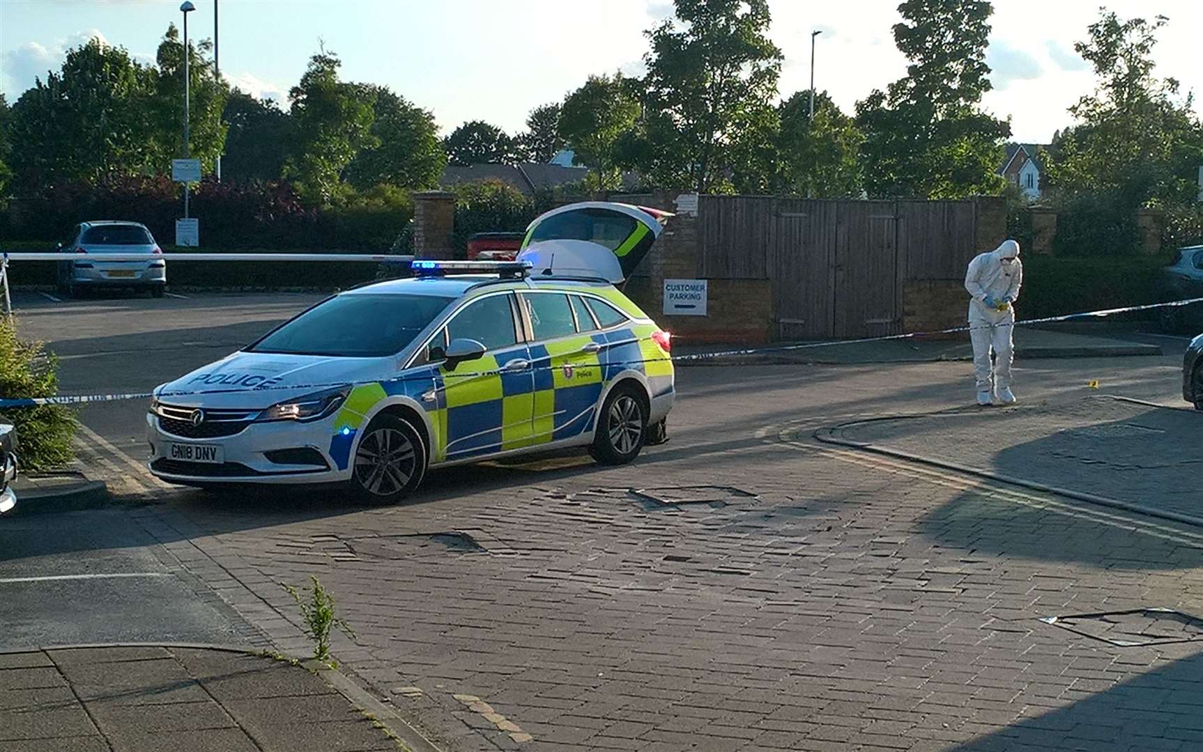 Police and forensics in the car park next to The Jenny Wren pub in Sittingbourne