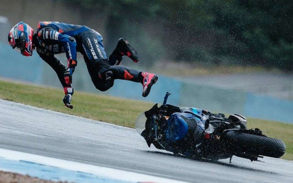 Bradley Ray loses his bike in the wet. Picture: Giulio Di Natale