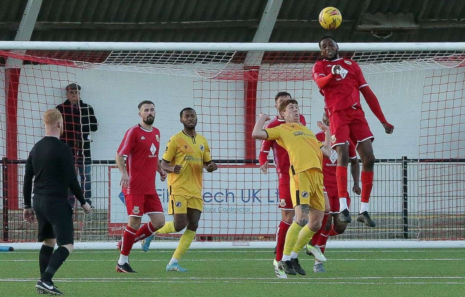 Forward Emmauel Oloyede heads clear. Picture: Les Biggs