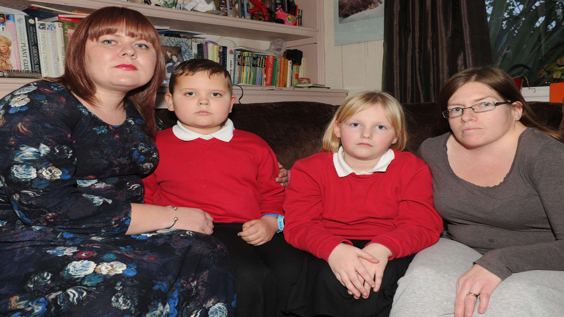 Gabrielius Puzaras, 8, and Chloe Chambers, 7, with their mums Clare Chambers, right, and Jurgita Puzariene. Picture: Steve Crispe