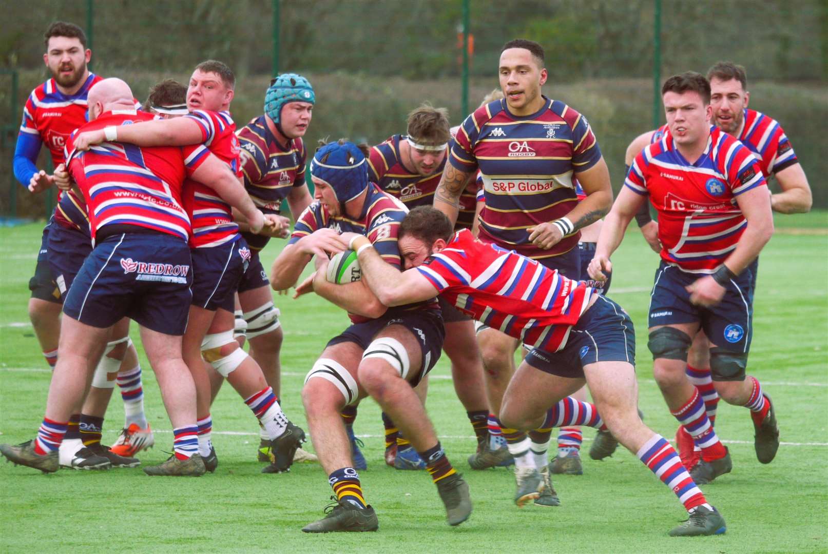 Tonbridge Juddians' Tommy Nicoll gets stuck into Old Albanians. Picture: Adam Hookway