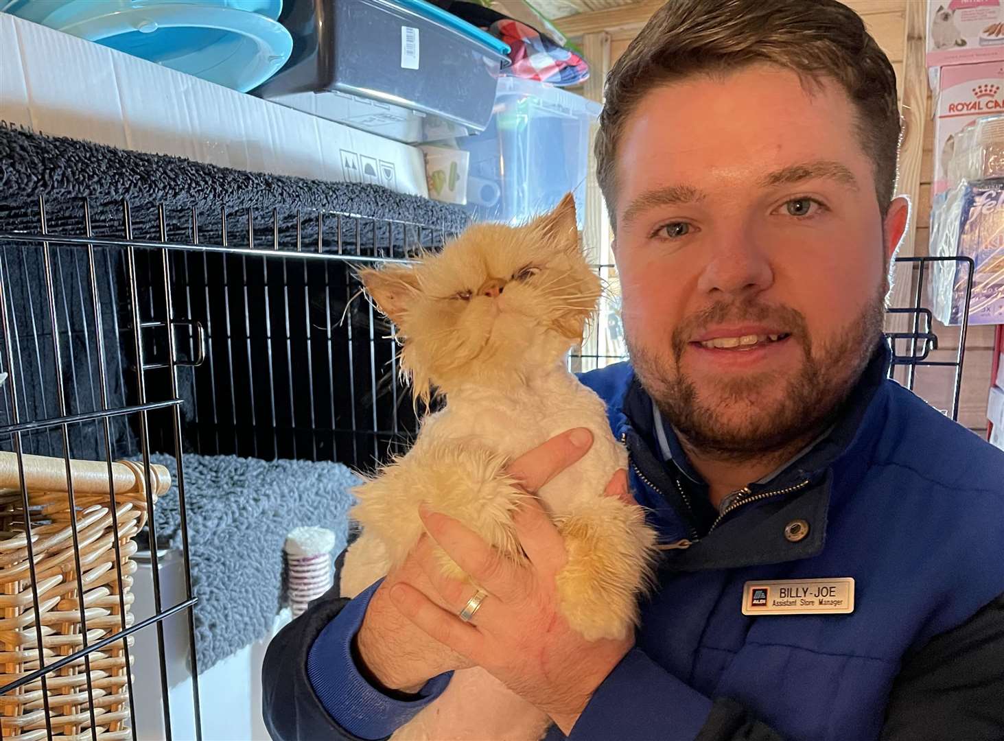 Billy and rescue cat Arthur, who arrived at Wisteria Cat Rescue in a bad condition