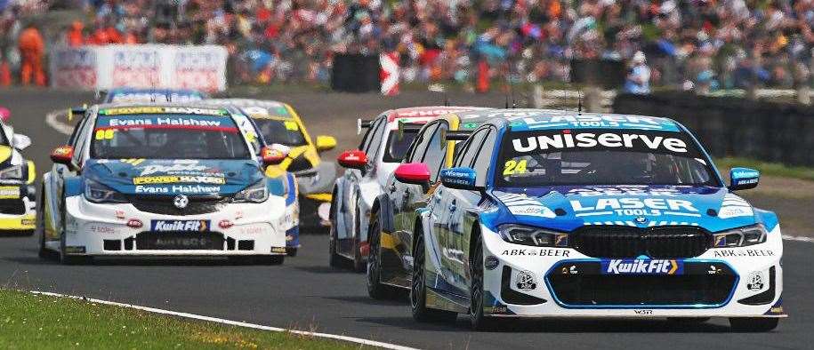 Platts Heath's Jake Hill (No.24) does battle in the British Touring Car Championship at Croft. Picture: Jakob Ebrey/BMW