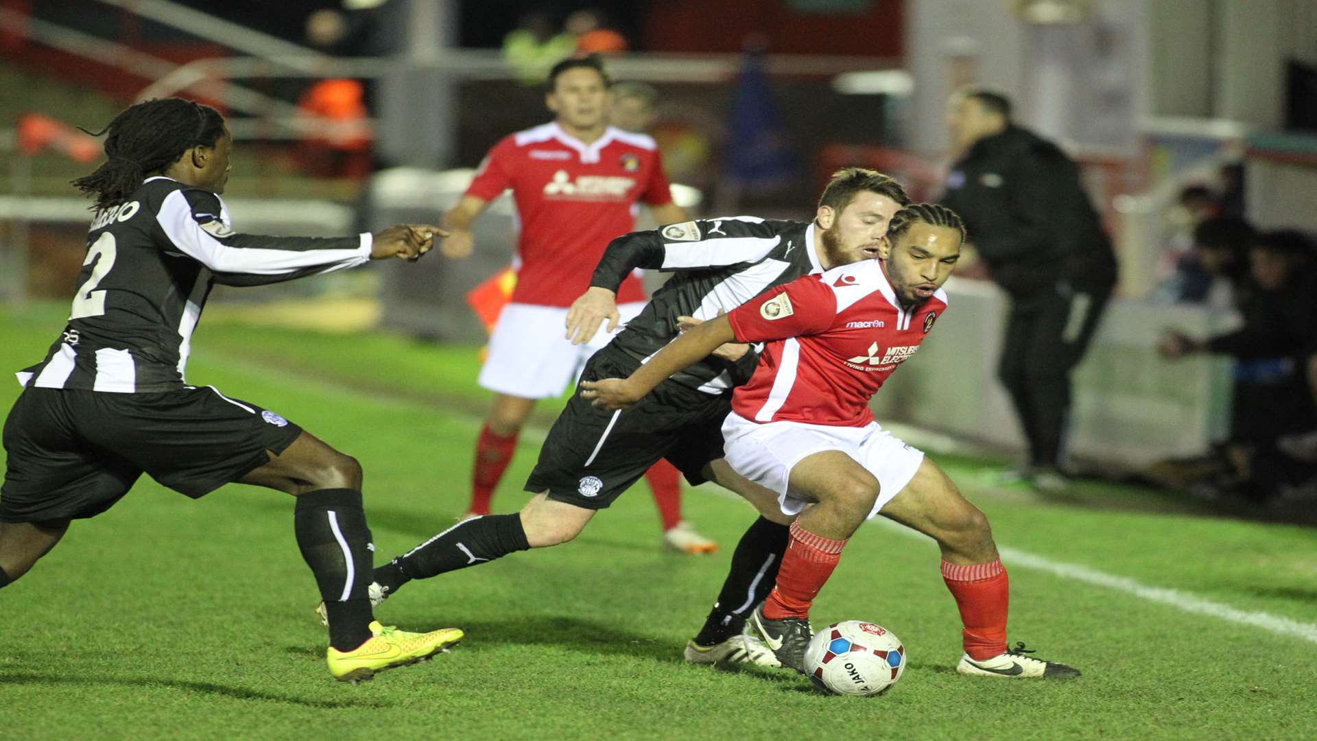 Brendan Kiernan takes on two players during Ebbsfleet's 1-0 win over Forest Green Rovers Picture: John Westhrop