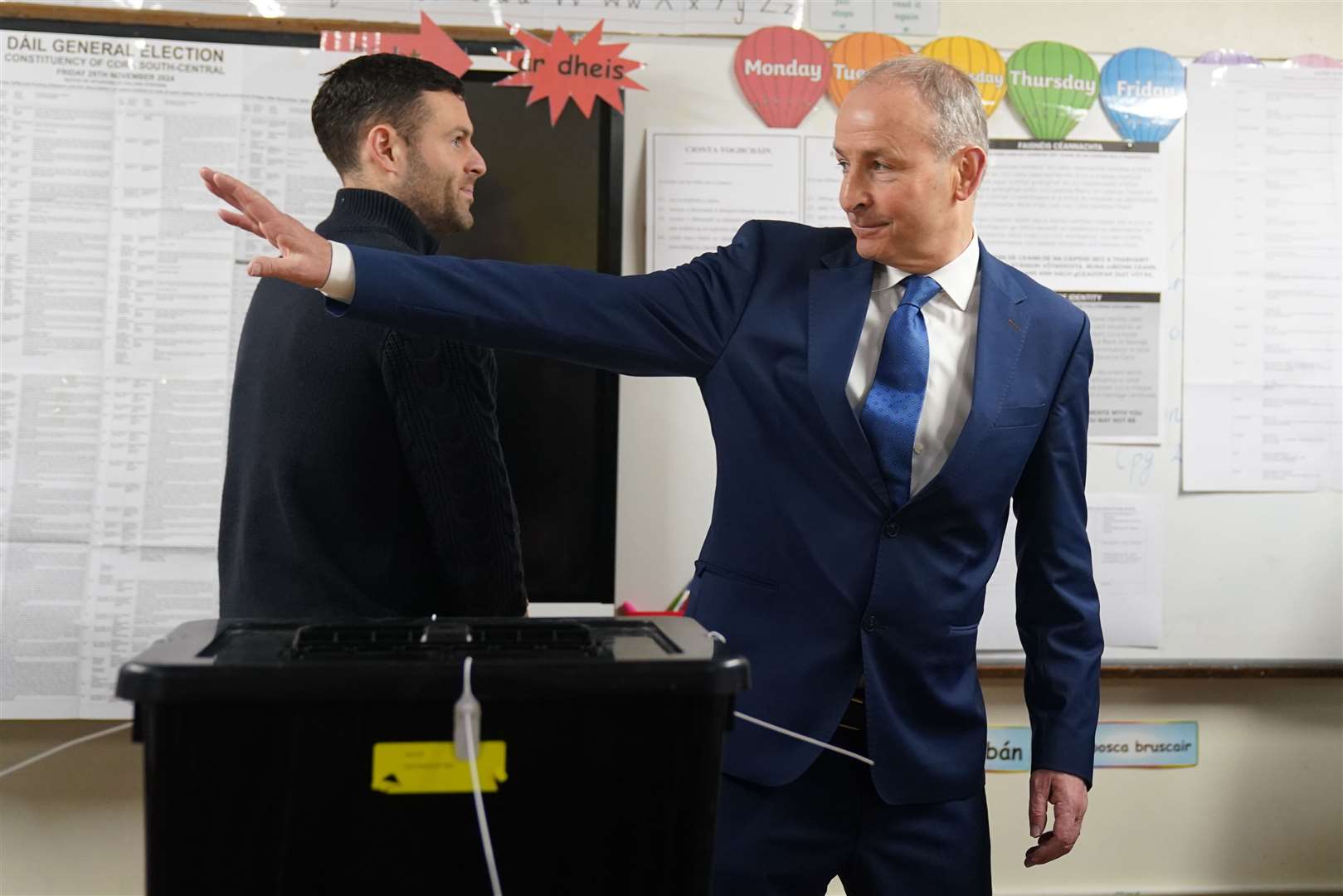 Tanaiste and Fianna Fail leader Micheal Martin casts his vote at St Anthony’s Boys National School, Beechwood Park, Ballinlough, Cork (Jacob King/PA)