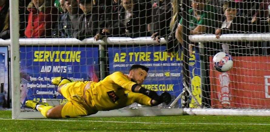 Inspired Sheppey keeper Aiden Prall makes one of several top saves on the night in their 4-1 FA Cup First-Round loss to League 2 Walsall. Picture: Marc Richards