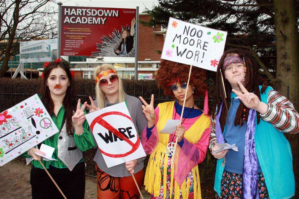 Protestors say it in words at Hartsdown Technology College, Margate, where war has been waged on poor literacy.