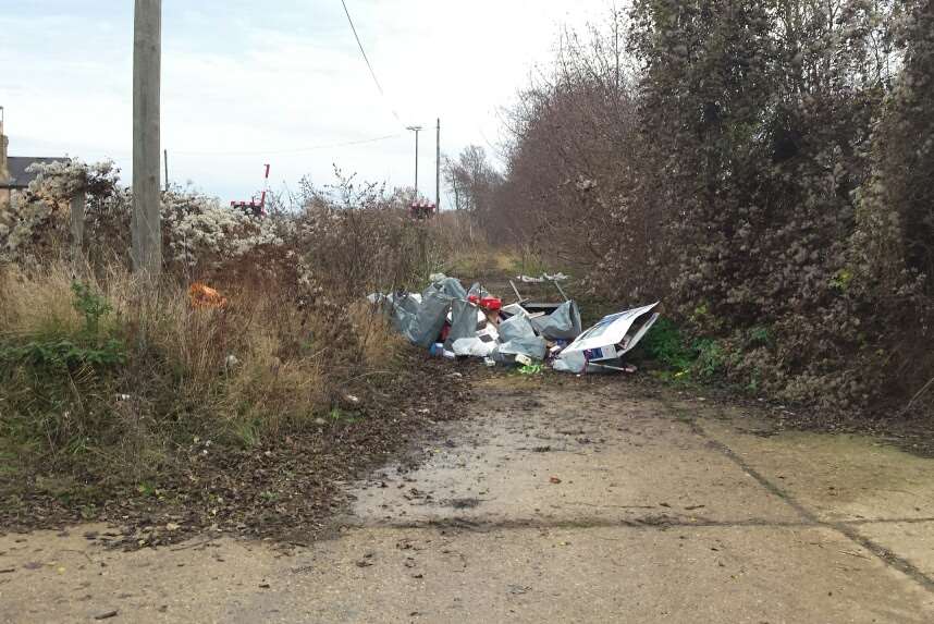 The fly-tipped rubbish at the level crossing in Teynham