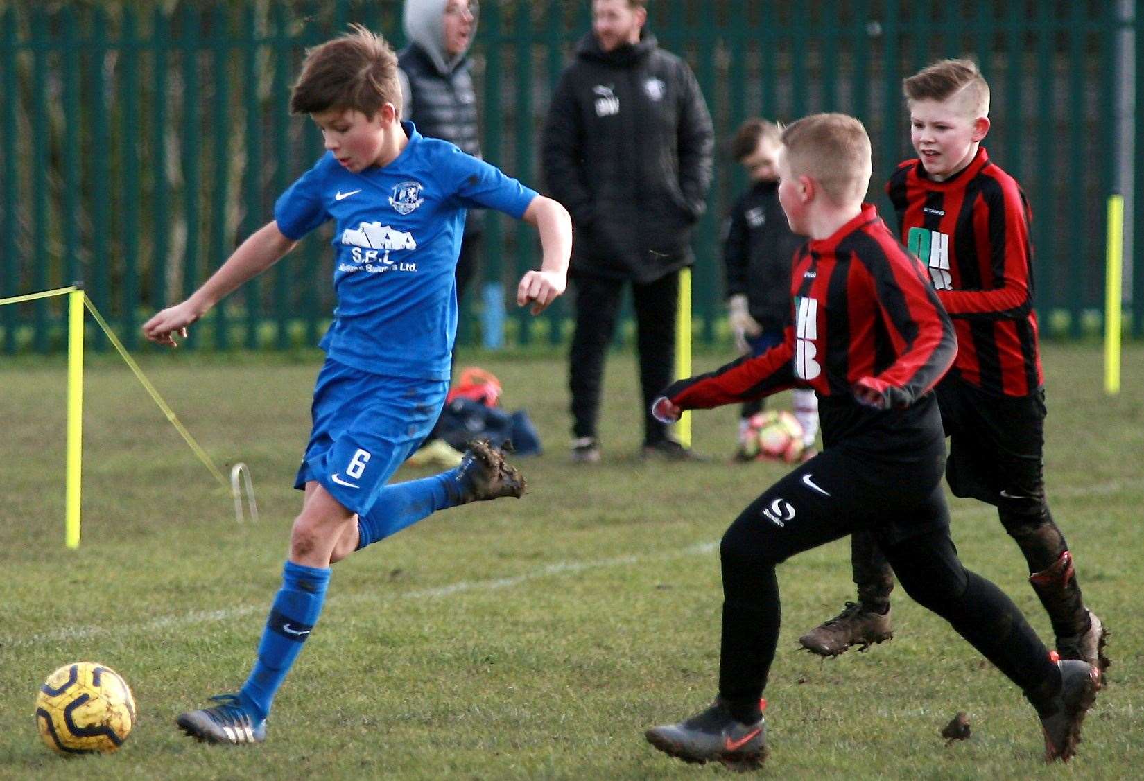 Medway United West under-12s (blue) take on Woodcoombe Youth under-12s. Picture: Phil Lee FM28210274