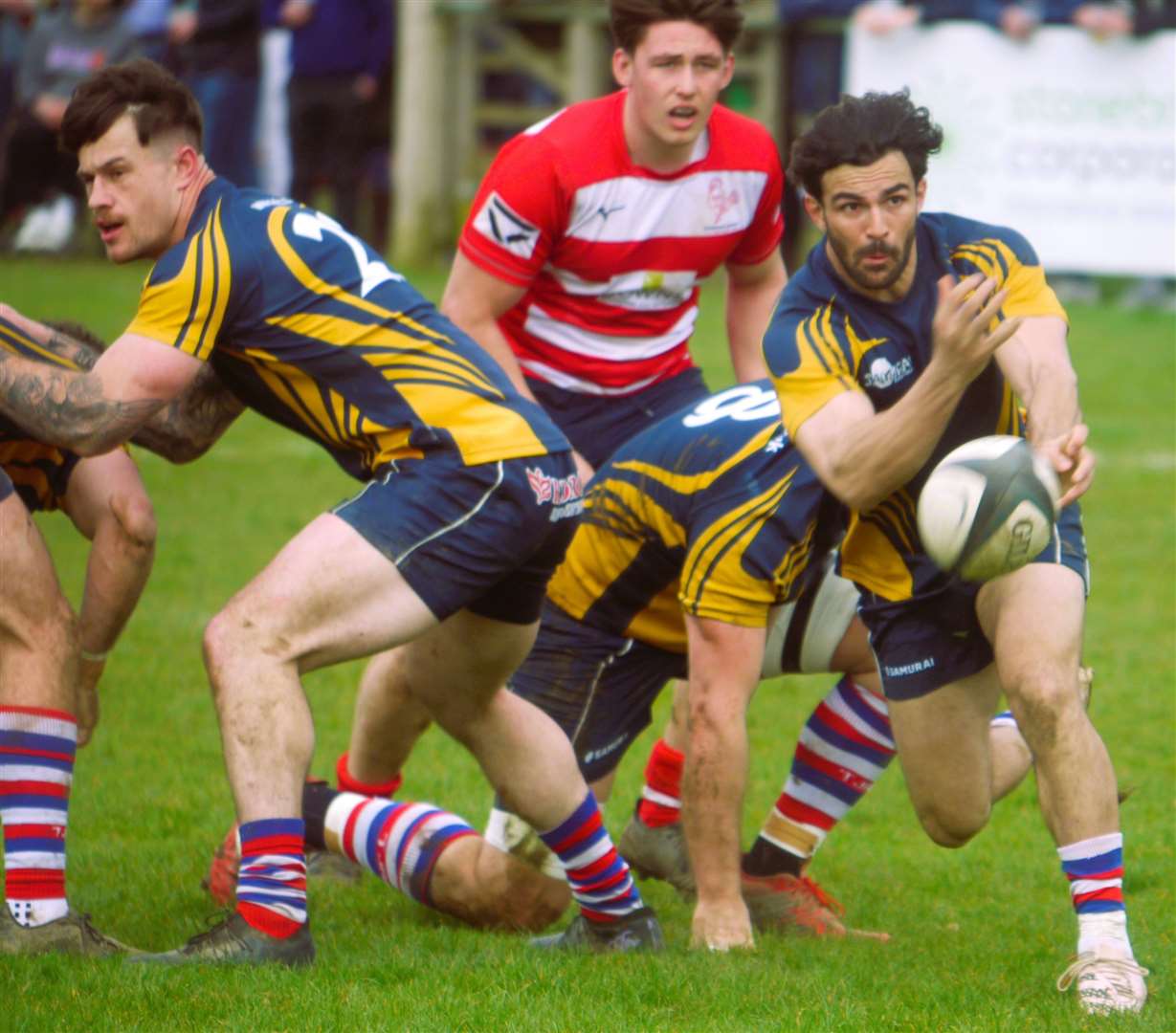 Tonbridge Juddians' Luca Petrozzi looks for a team-mate against Dorking. Picture: Adam Hookway