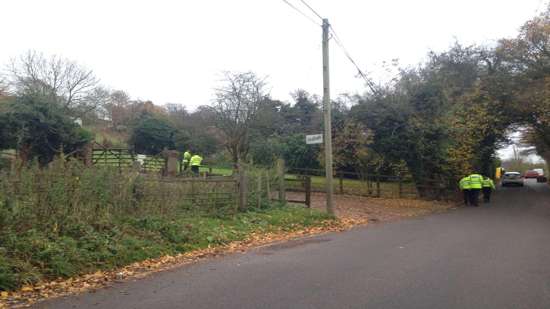 Officers search the neighbouring property