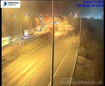 Lorries queue on the coastbound side, while police have blocked off the Londonbound lanes of the M20