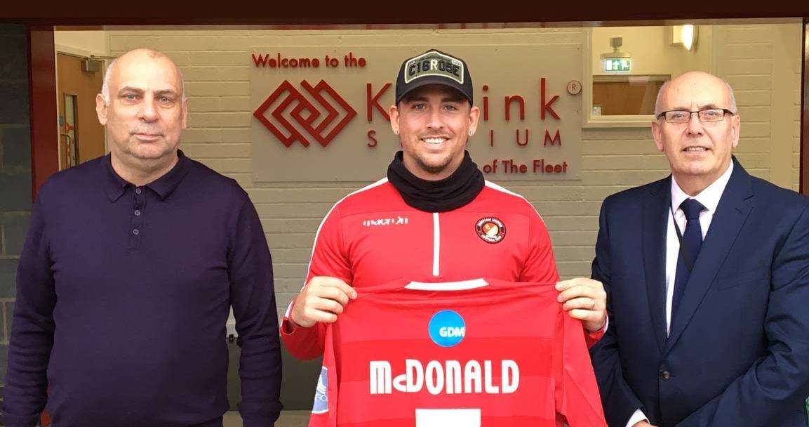 Cody McDonald with Ebbsfleet boss Garry Hill and managing director Dave Archer