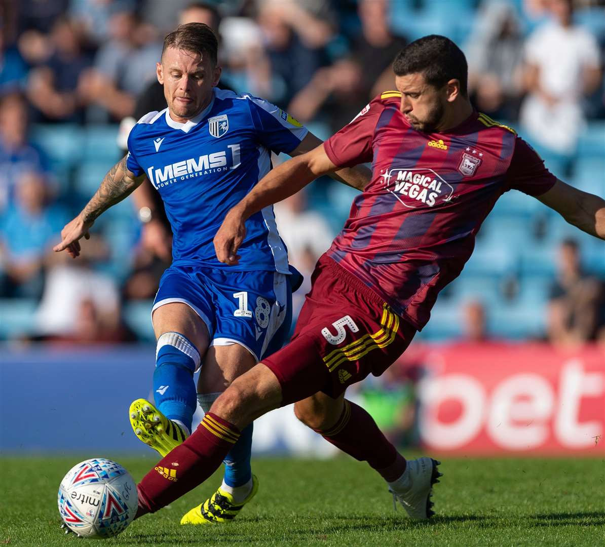 Mark Byrne gets a pass away from Ipswich's James Wilson Picture: Ady Kerry