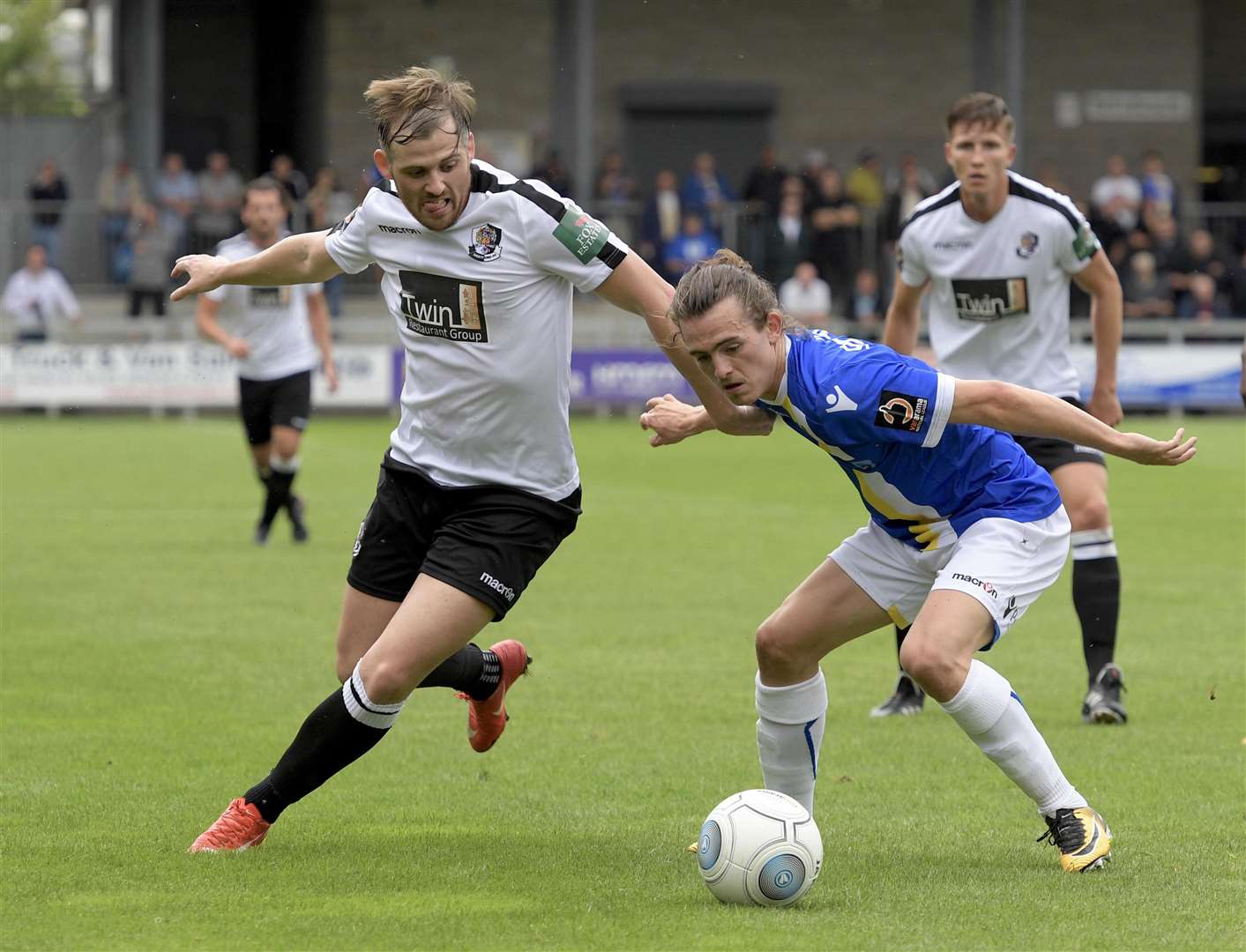 Dartford's Tom Murphy battles for possession Picture: Andy Payton