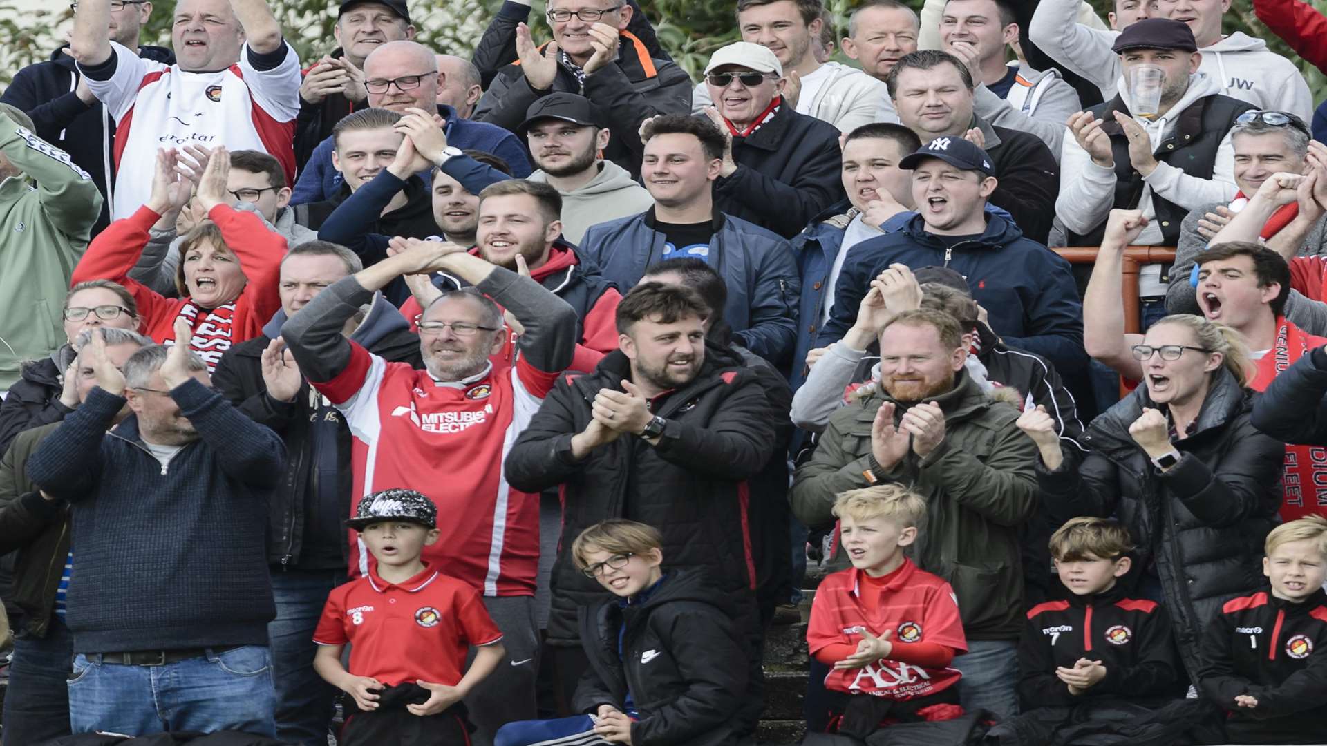 Supporters celebrate Ebbsfleet's semi-final win over Hampton & Richmond Picture: Andy Payton