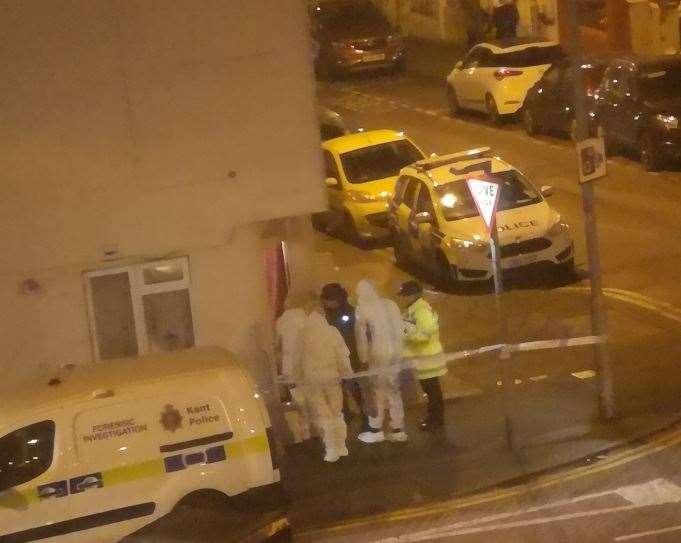 Police and forensic officers at the flat in Richmond Road, Gillingham after Ms Price's body was discovered