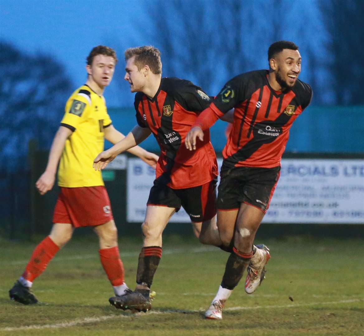 Johan Caney-Bryan celebrates one of his two goals for Sittingbourne against Ramsgate Picture: John Westhrop