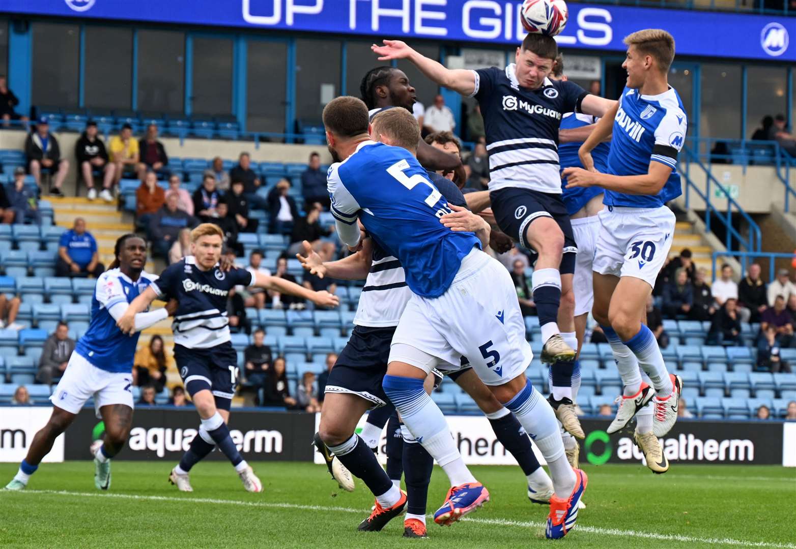 Sam Gale gets up for the header above the Millwall defence Picture: Barry Goodwin