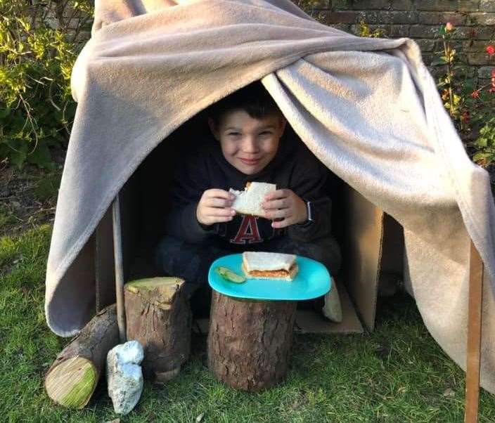 Leaders of the Loose Swiss Tiger Pack challenged the cubs to build a den or shelter at home