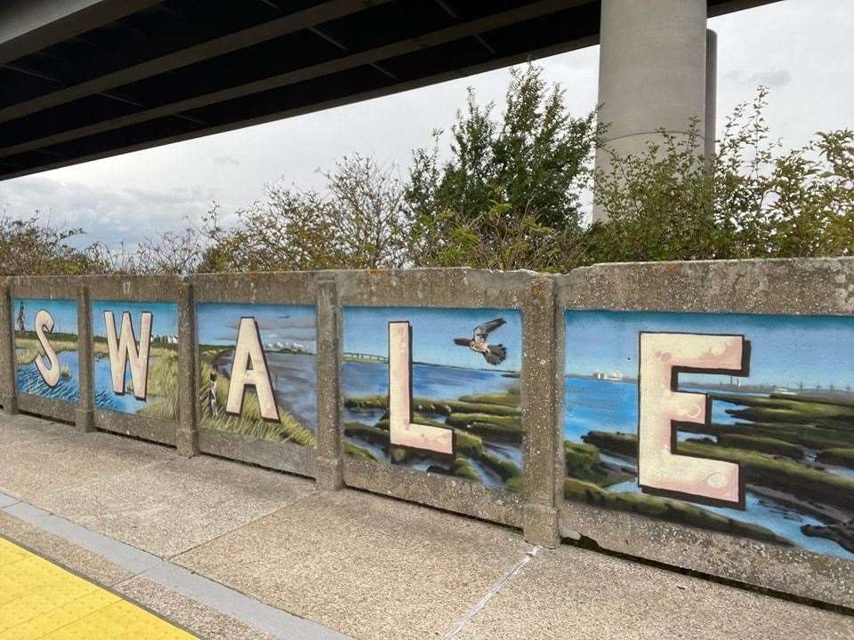 The mural at Swale Halt railway platform painted by artist Graham Upton. Picture: Kent Community Rail Partnership