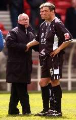 Paul Scally (left) commiserates with Barry Ashby and Darius Henderson on Sunday. Picture: BARRY GOODWIN