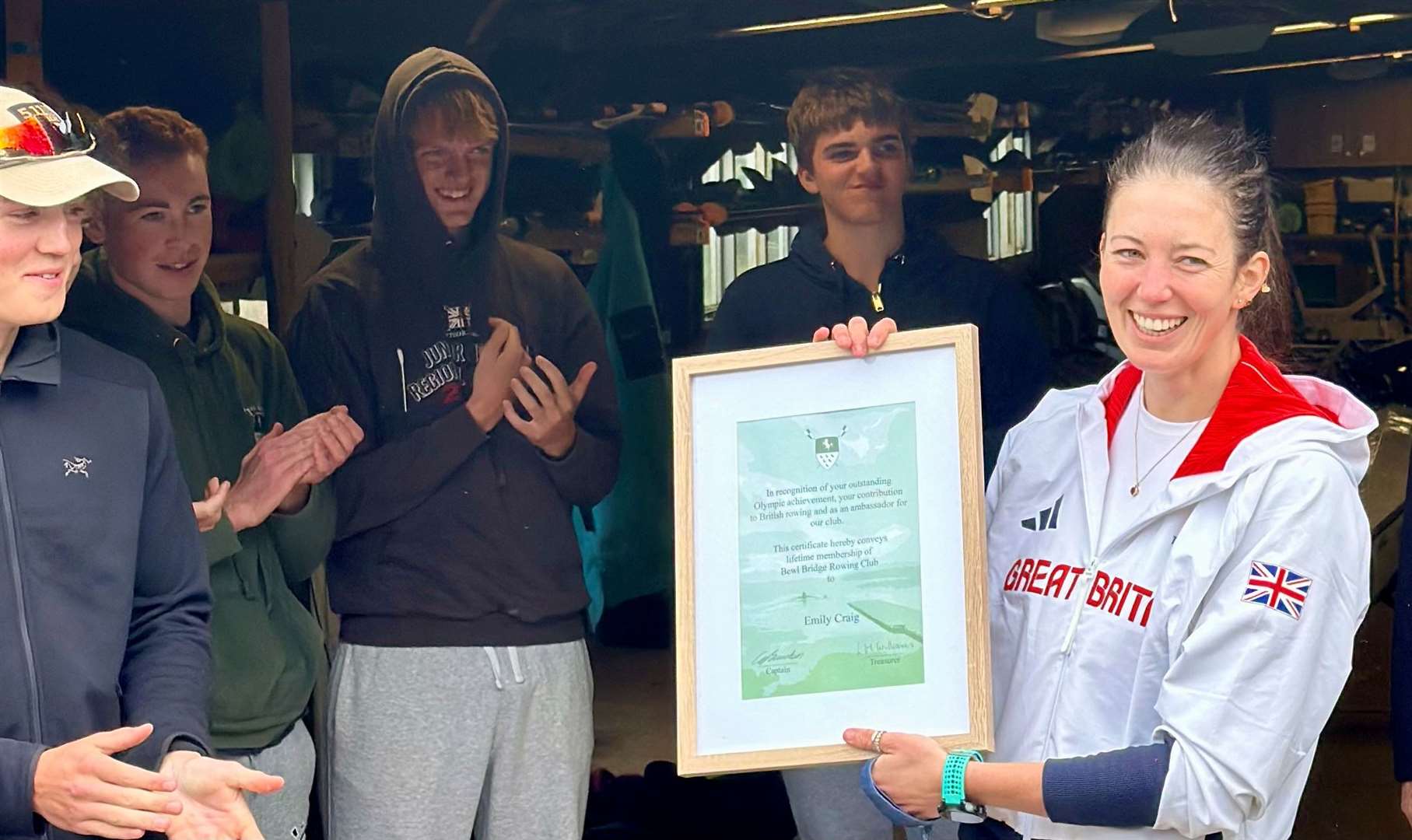 Emily Craig receives her life membership to Bewl Bridge Rowing Club