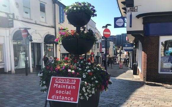 Signs have been placed around the high street as part of Covid-19 safety measures.